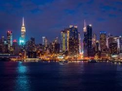 Photo of the New York City skyline at night